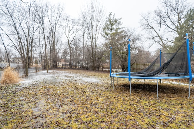 view of yard featuring a trampoline