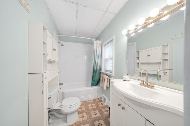 full bathroom with vanity, shower / bathtub combination with curtain, and toilet