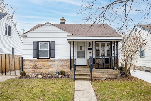 bungalow with a front yard