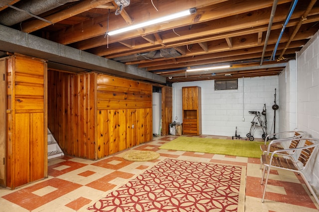 basement with white refrigerator