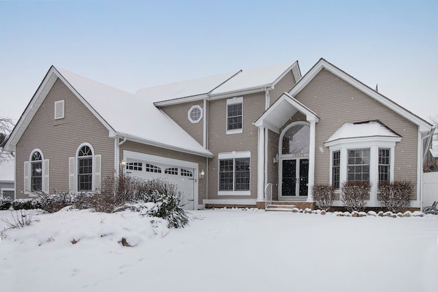 view of front of home with a garage