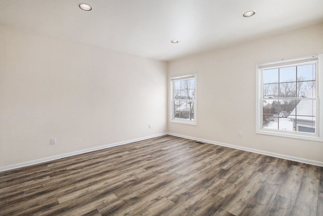 16073 Silverwood Dr, Fenton, MI 48430 - spare room with recessed lighting, baseboards, and dark wood finished floors