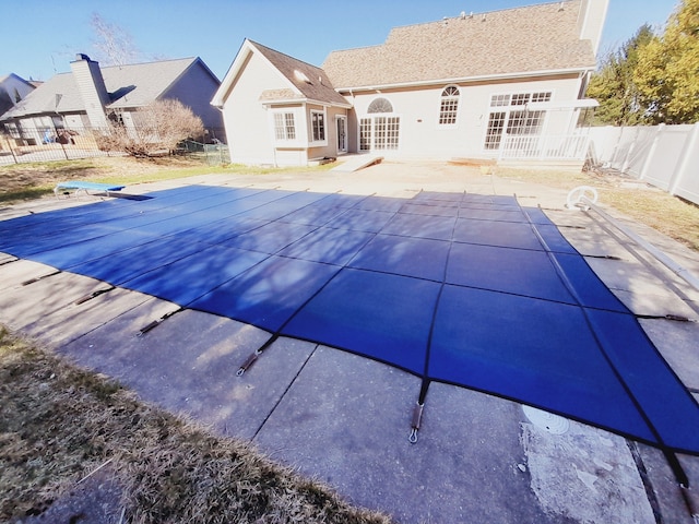 16073 Silverwood Dr, Fenton, MI 48430 - view of swimming pool featuring a fenced in pool, a patio area, and a fenced backyard
