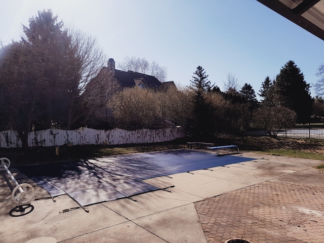 16073 Silverwood Dr, Fenton, MI 48430 - view of swimming pool with a patio and fence