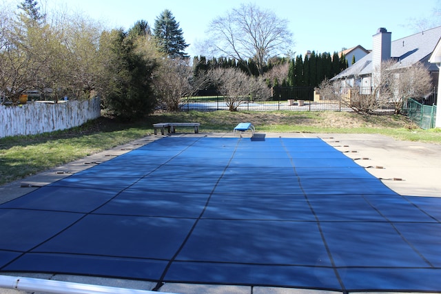 16073 Silverwood Dr, Fenton, MI 48430 - view of swimming pool with a patio and fence