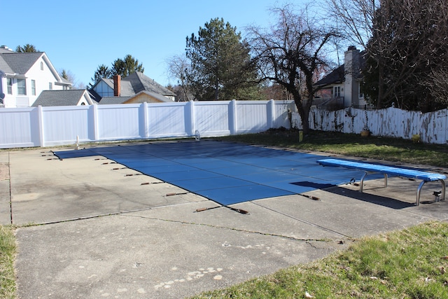 16073 Silverwood Dr, Fenton, MI 48430 - view of swimming pool featuring a fenced in pool, a patio area, and a fenced backyard