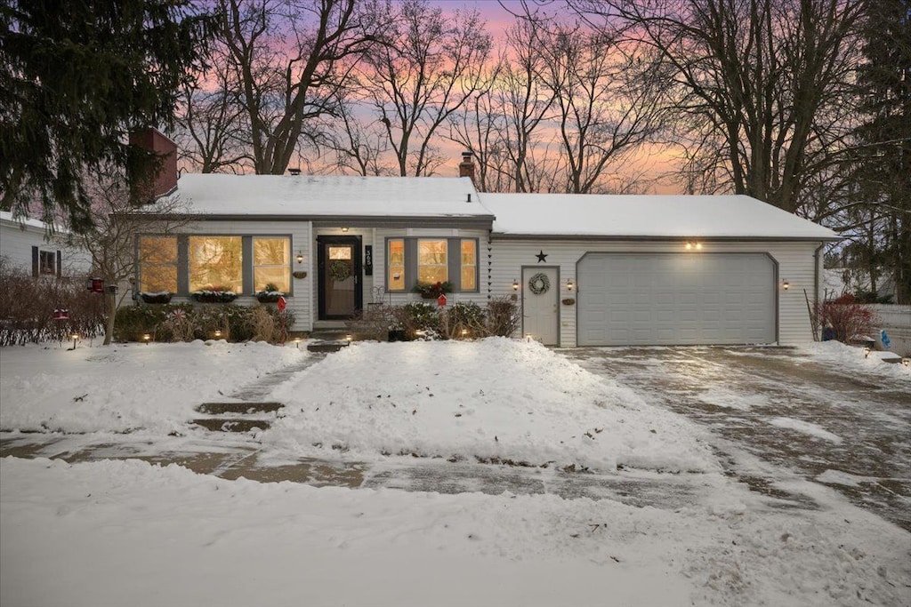 view of front of property featuring a garage