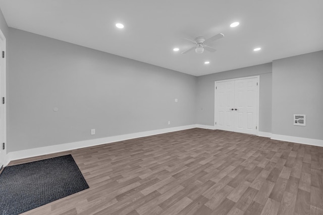 empty room featuring light hardwood / wood-style floors and ceiling fan