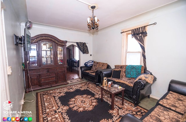 carpeted living room with an inviting chandelier