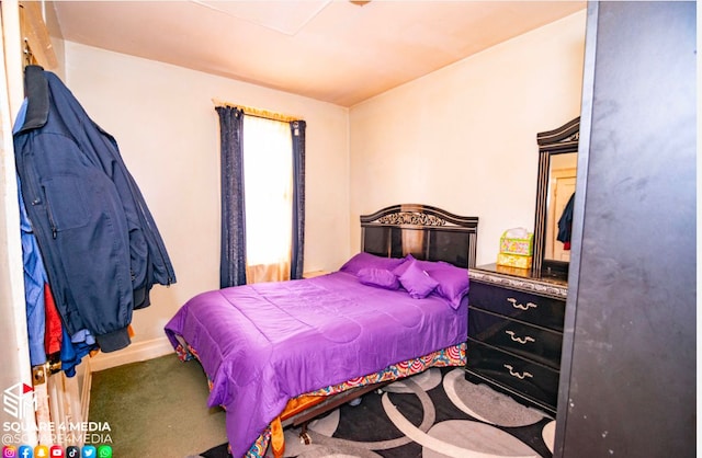 bedroom featuring carpet flooring