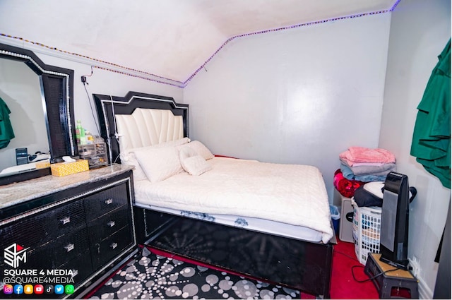 bedroom with vaulted ceiling