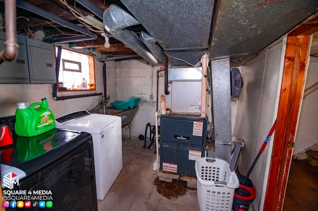 clothes washing area featuring washer and clothes dryer