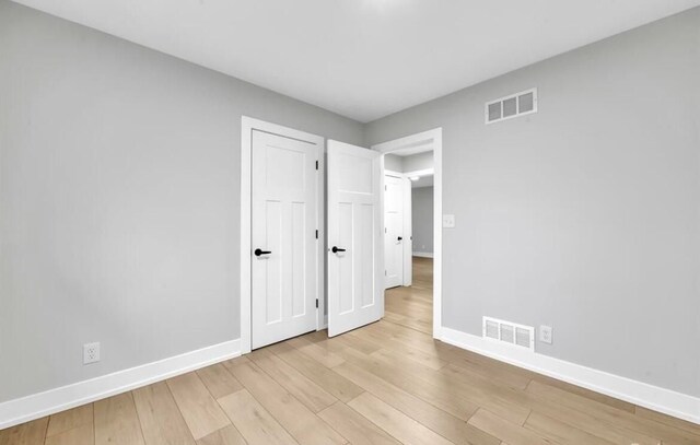 unfurnished bedroom featuring light hardwood / wood-style flooring