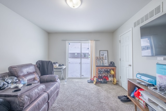 living area with carpet flooring