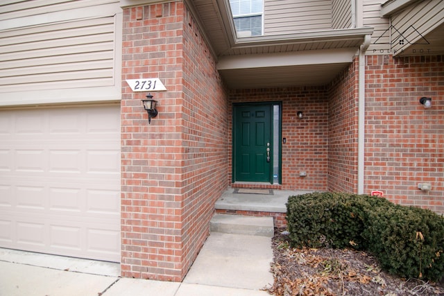 property entrance with a garage