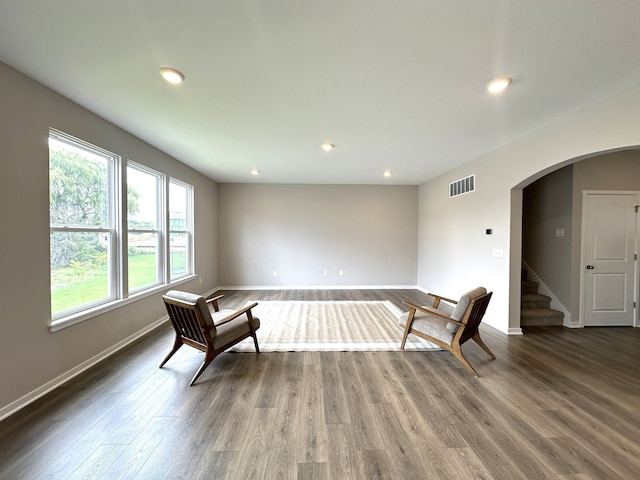 unfurnished room featuring dark hardwood / wood-style floors