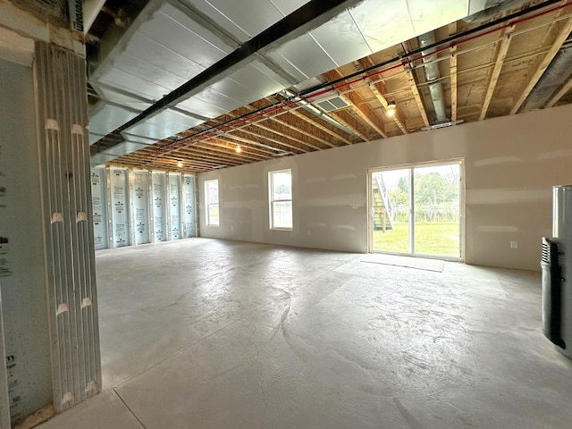 basement featuring plenty of natural light