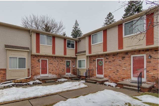 multi unit property featuring brick siding