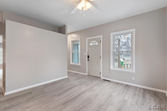 entryway featuring ceiling fan and light hardwood / wood-style flooring