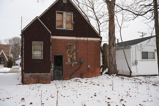 view of snow covered property