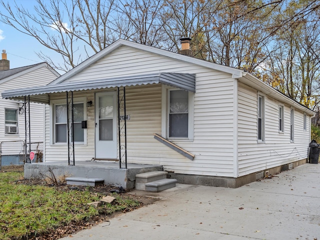 bungalow featuring cooling unit