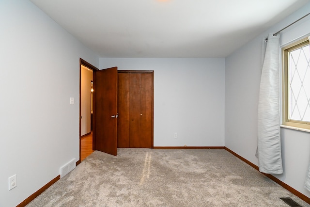 view of carpeted spare room