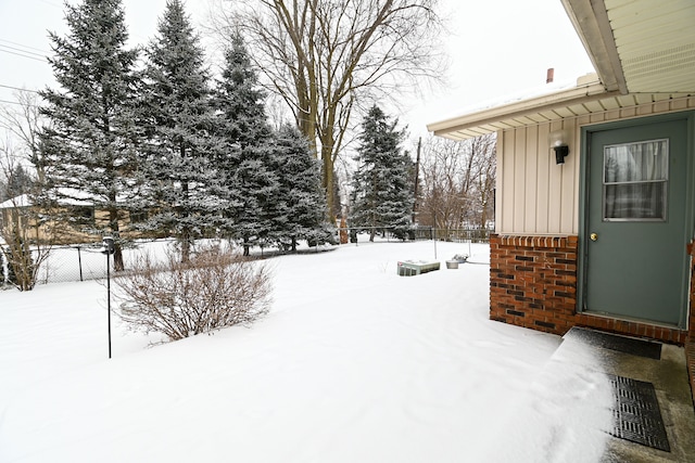 view of yard covered in snow