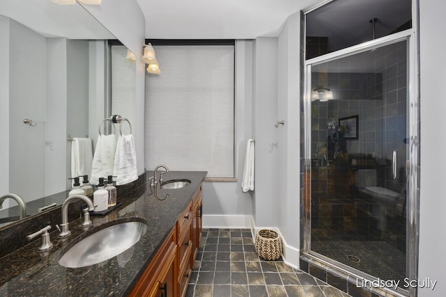 bathroom with vanity and walk in shower