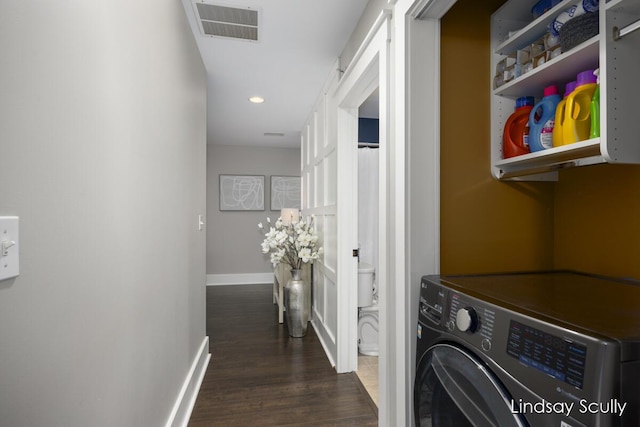 laundry room with dark hardwood / wood-style floors