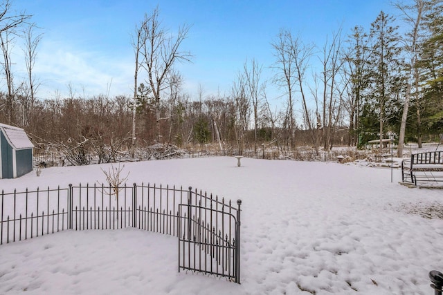 view of yard layered in snow