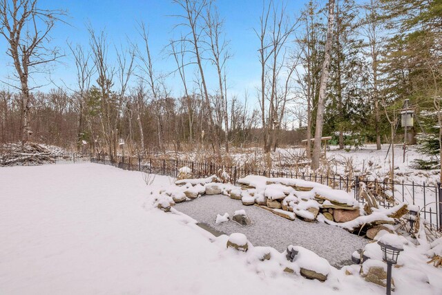 view of yard covered in snow