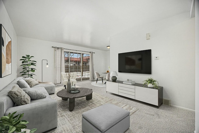 living room featuring carpet floors