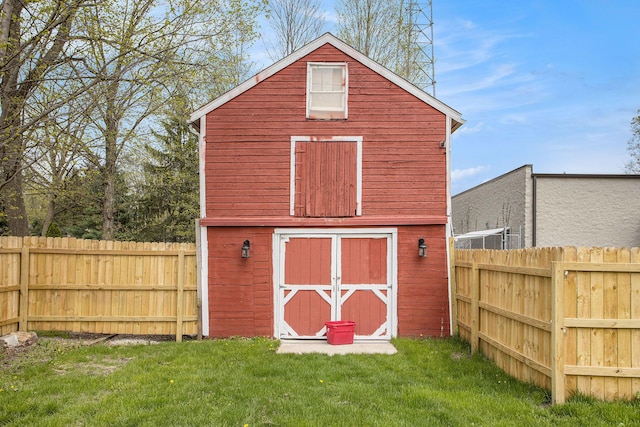 120 N Main St, Climax, MI 49034 - view of barn with a lawn, a storage shed, and a fenced backyard