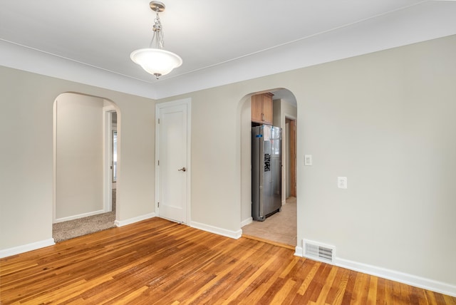 empty room featuring light wood-type flooring