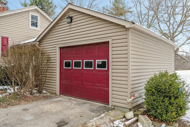 view of snow covered garage