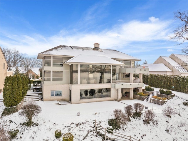 view of snow covered property