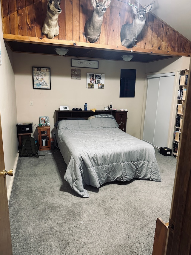 carpeted bedroom with a closet