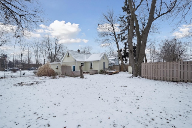 view of snow covered property