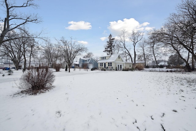 view of yard covered in snow