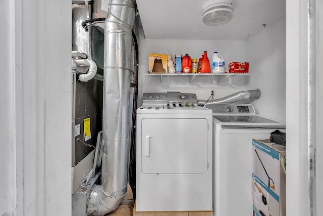 laundry room with washer and clothes dryer