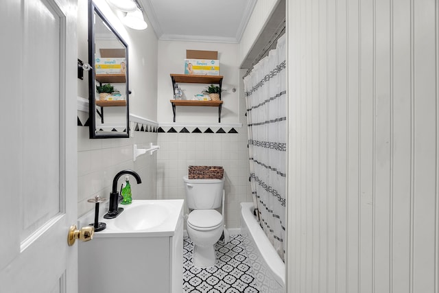 full bathroom with ornamental molding, vanity, tile walls, tile patterned flooring, and toilet