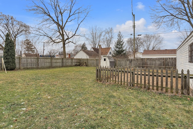 view of yard featuring a storage unit