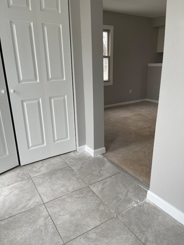 interior space with light colored carpet