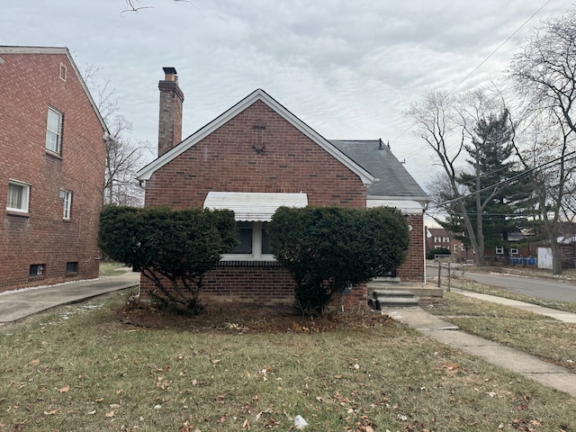 exterior space with a front yard