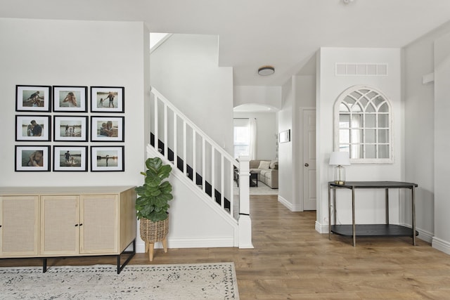 entrance foyer with hardwood / wood-style floors