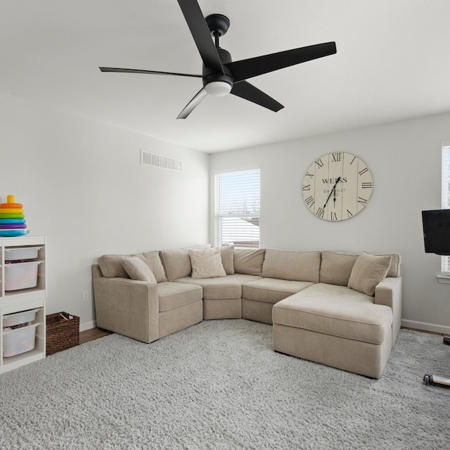 living room with ceiling fan