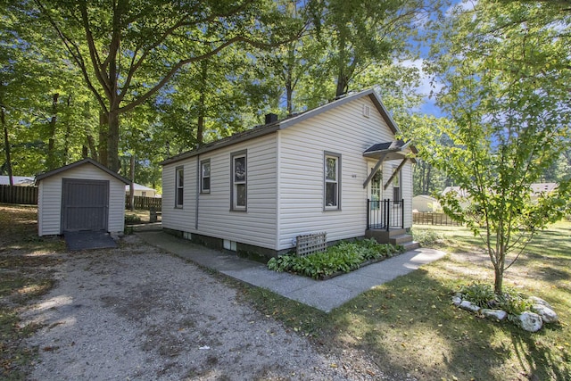 exterior space with a shed