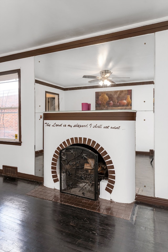 details featuring wood-type flooring, ceiling fan, and crown molding