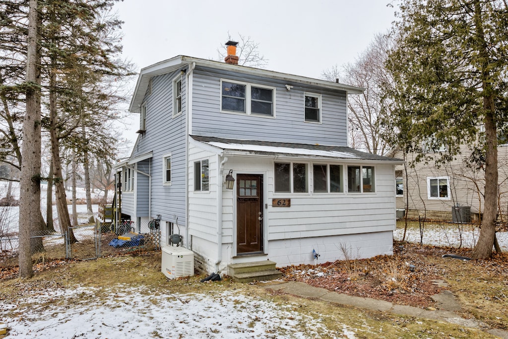 front facade with central AC unit