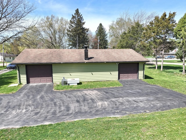 view of detached garage